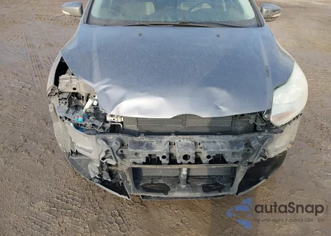 2014 Ford Focus Se z USA, uszkodzony, nr VIN 1FADP3F24EL246889